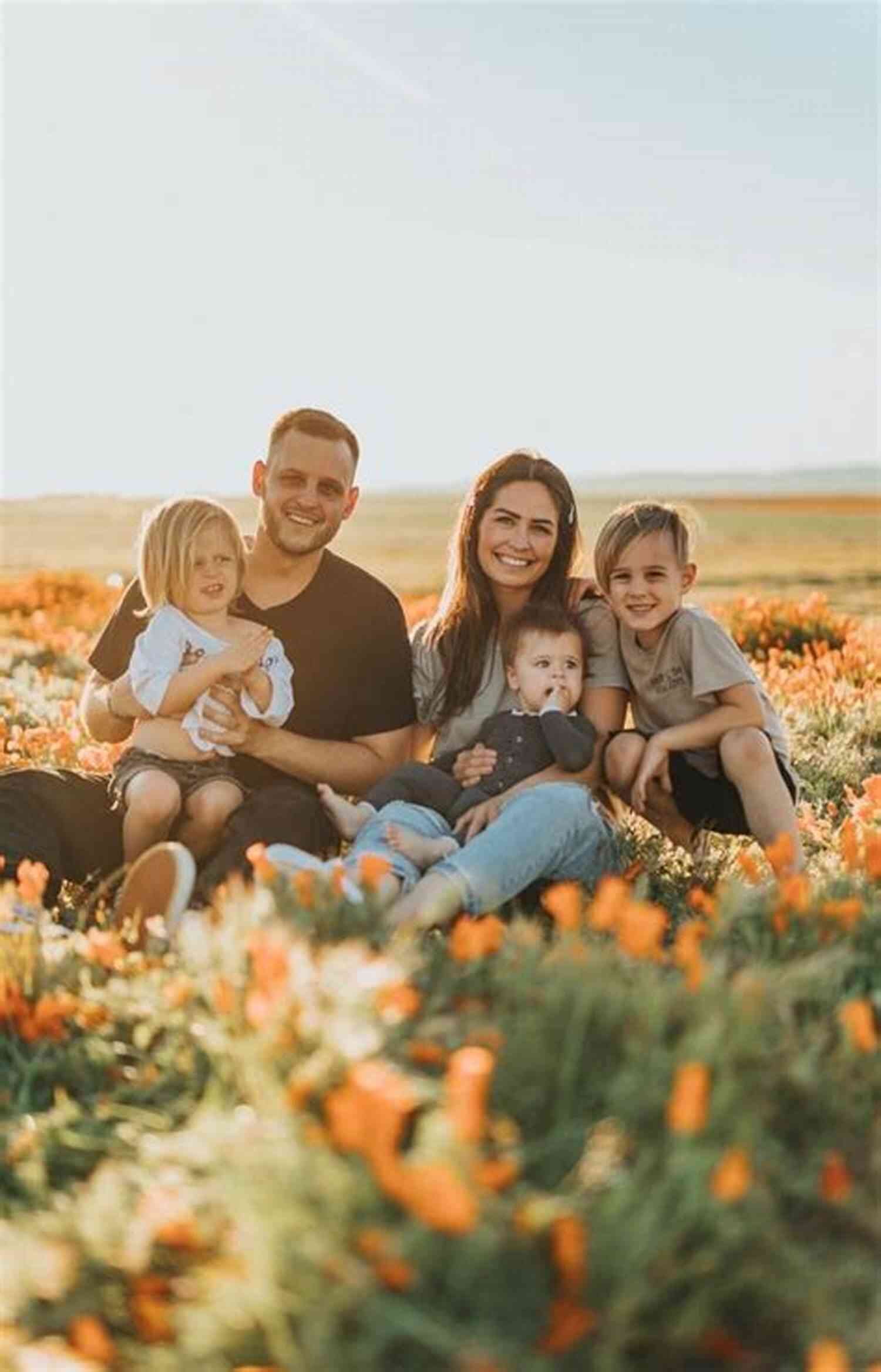 A Joyful Family Gathering, Standing United In Front Of A Beautiful Sunset One Family In A Million