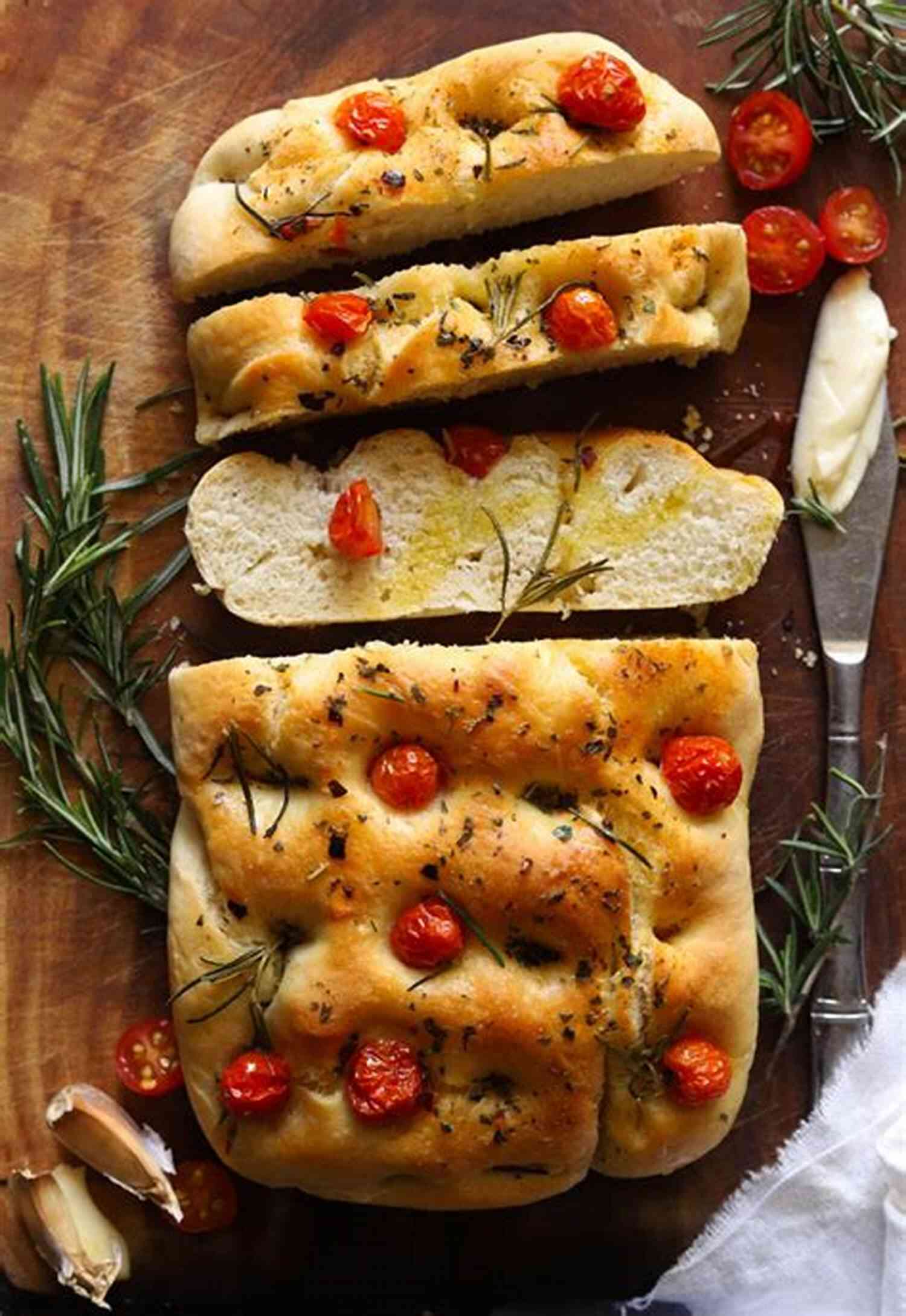 A Square Slice Of Golden Focaccia Bread Topped With Fresh Rosemary, Cherry Tomatoes, And Olives For The Love Of Bread: Healthy Breads Pita And Biscuits (Cookbooks From Nana 1)