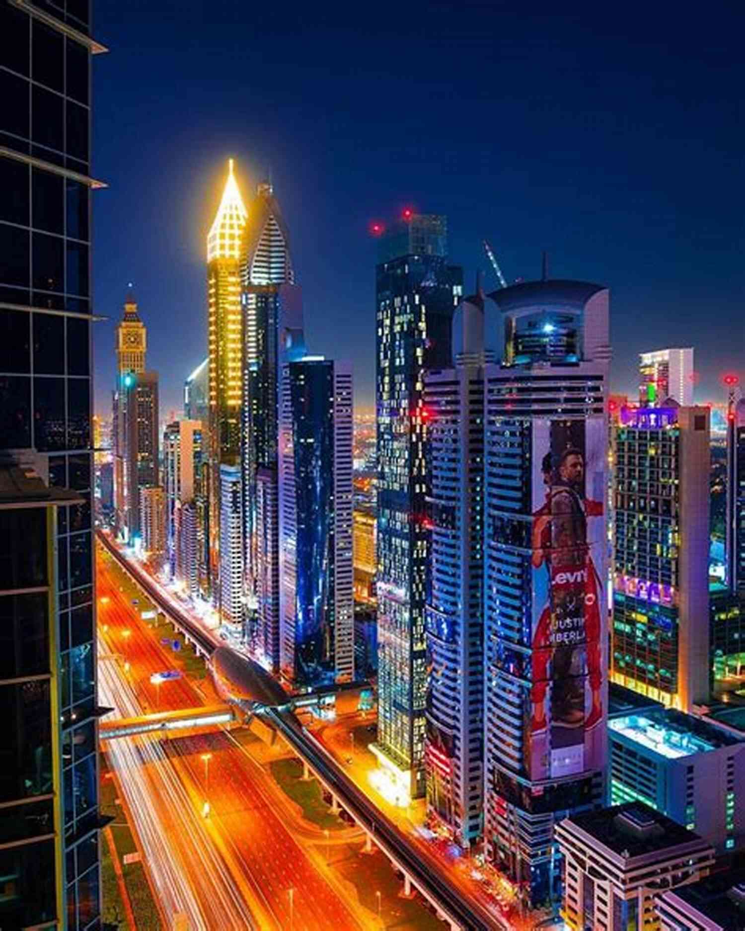 Breathtaking Cityscape With Majestic Skyscrapers Illuminated In The Evening Right In Front Of Us: Ordained From The Beginning
