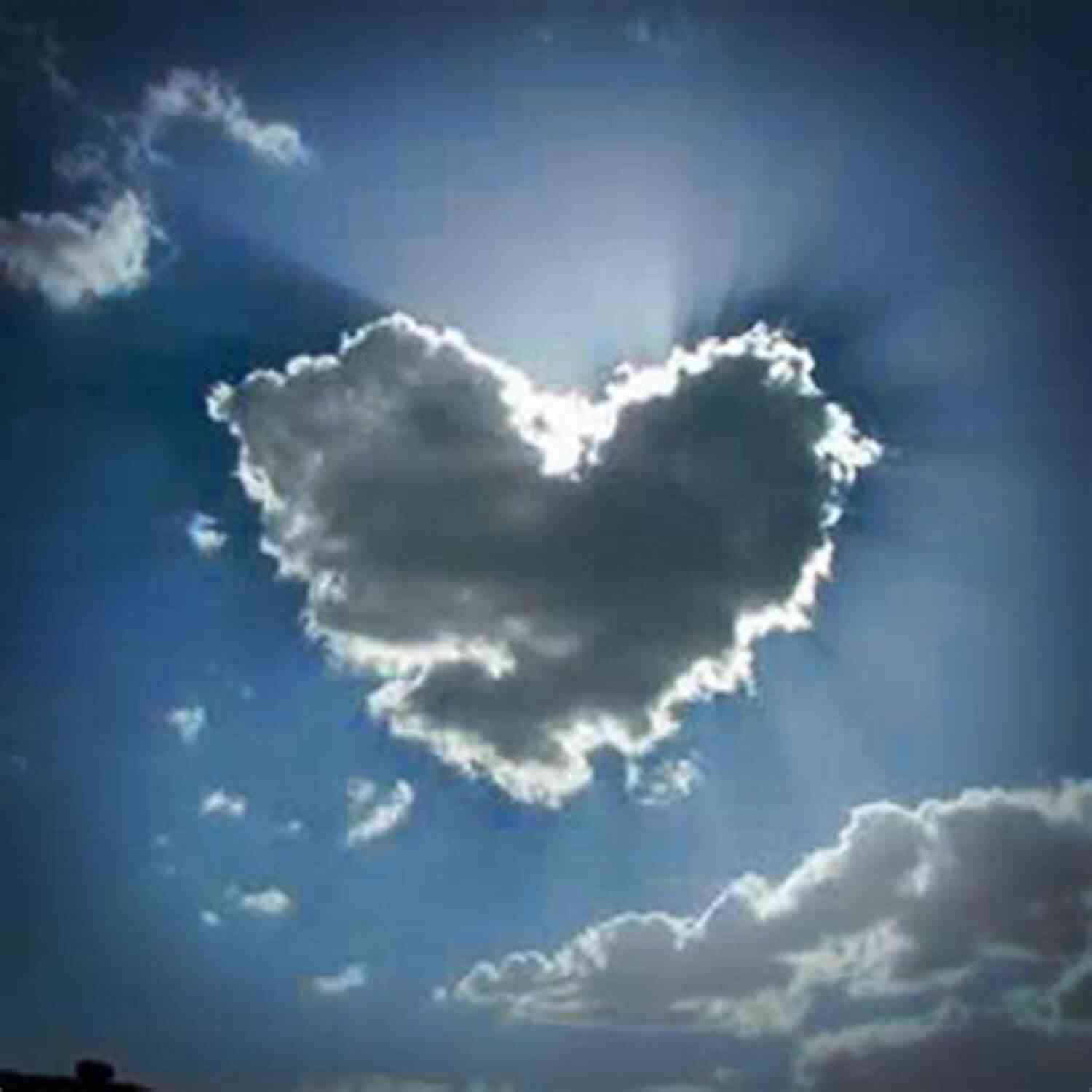Clouds Forming The Shape Of A Heart Against A Sunset Sky Romantic Things: A Tree A Rock A Cloud