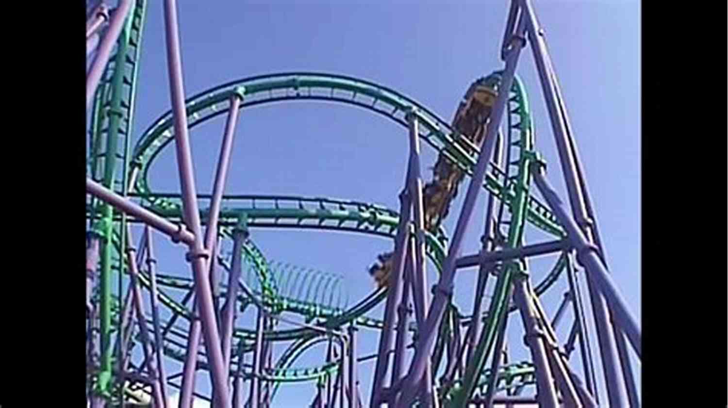 Snapshot Of Amusement Ride In Action Lines At The Amusement Rides